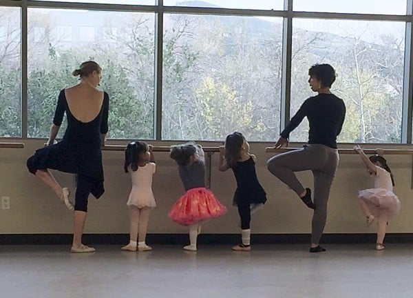 two female instructors teaching ballet lessons to toddlers at the fairmount center for the arts