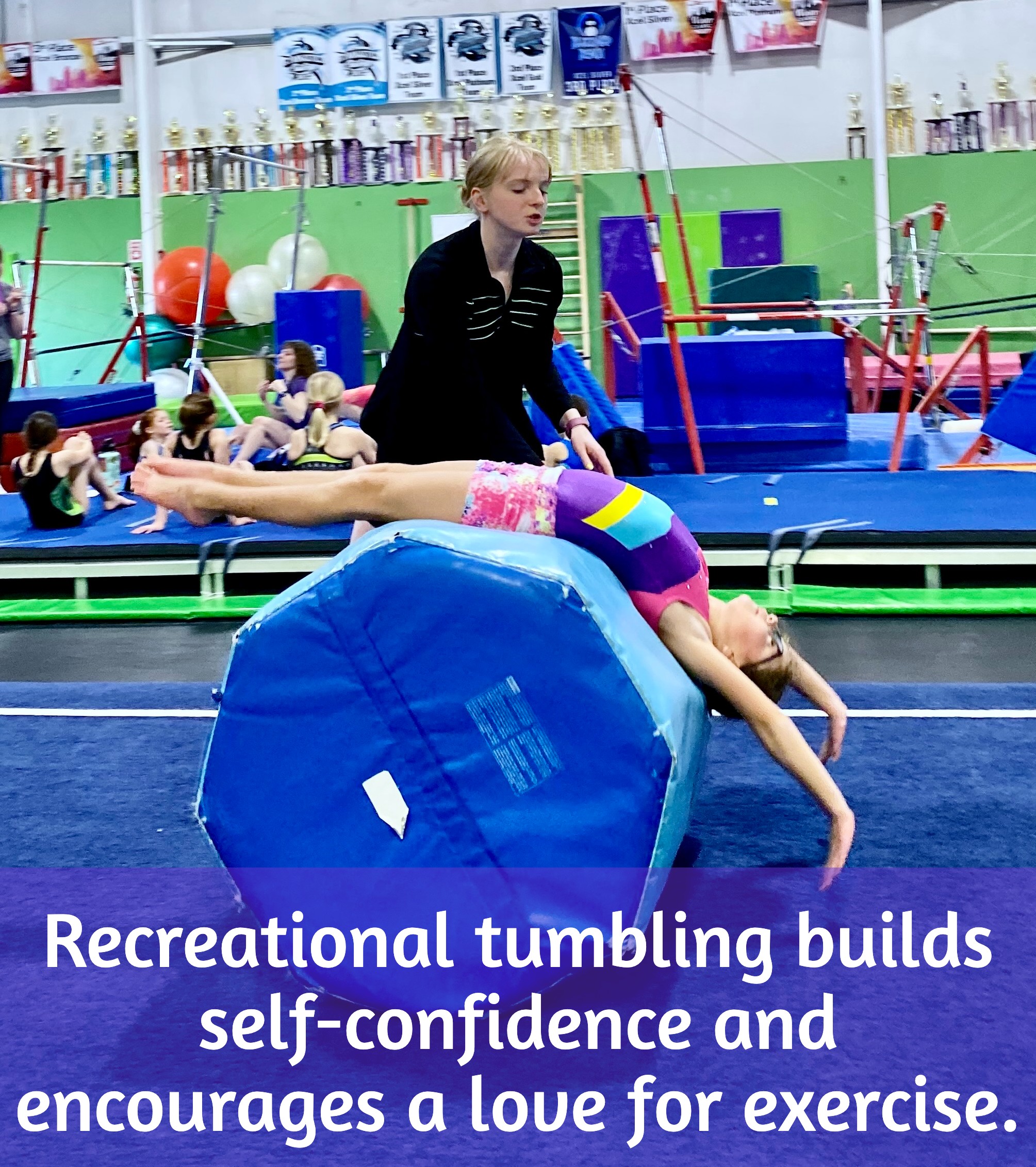 Girl learning beginning tumbling in EmethGym class Girl learning beginning tumbling in EmethGym class