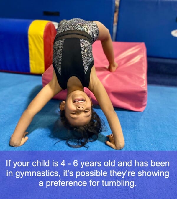 Young girl learning basic tumbling Young girl learning basic tumbling