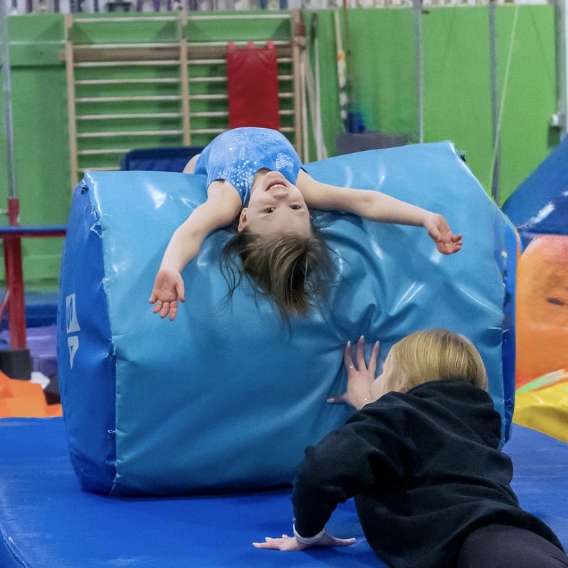 Girl in beginning gymnastics class Moonlights