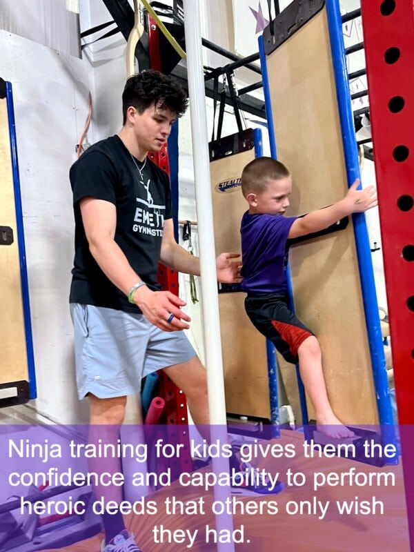 Coach standing by in ninja class for kids